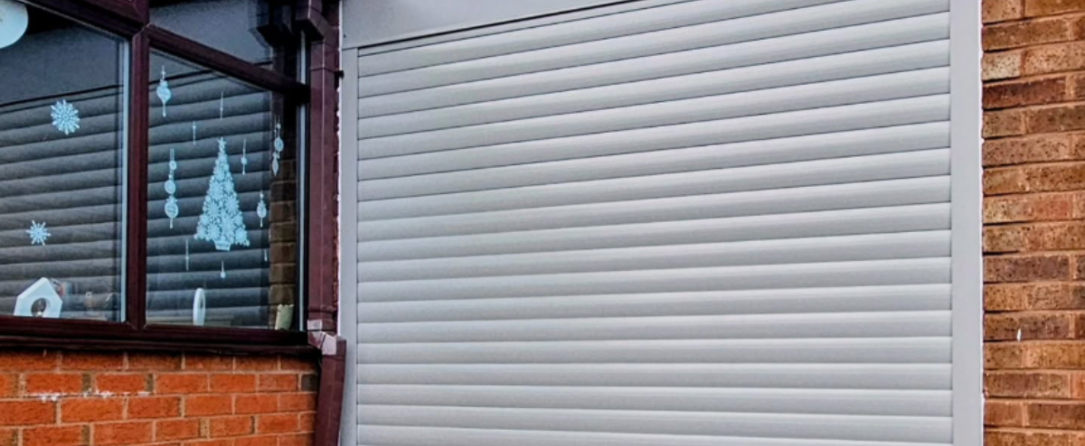 Last roller garage door of 25, agate grey door and frame, safety edge system